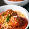 meta balls with noodles served on white ceramic bowl