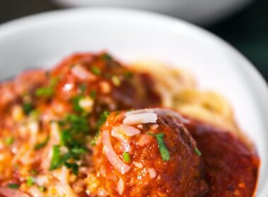 meta balls with noodles served on white ceramic bowl