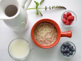 bowl of cereal near white pitcher