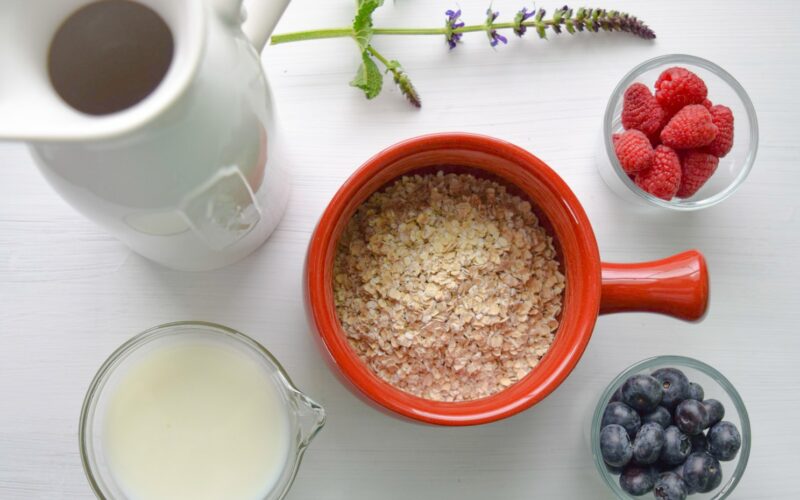 bowl of cereal near white pitcher