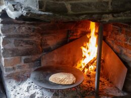 a fire in a brick oven