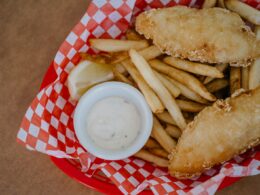 fried food on red and white checkered plate