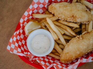 fried food on red and white checkered plate