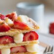 sliced strawberries on white ceramic plate