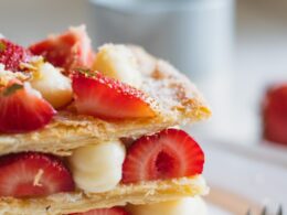 sliced strawberries on white ceramic plate