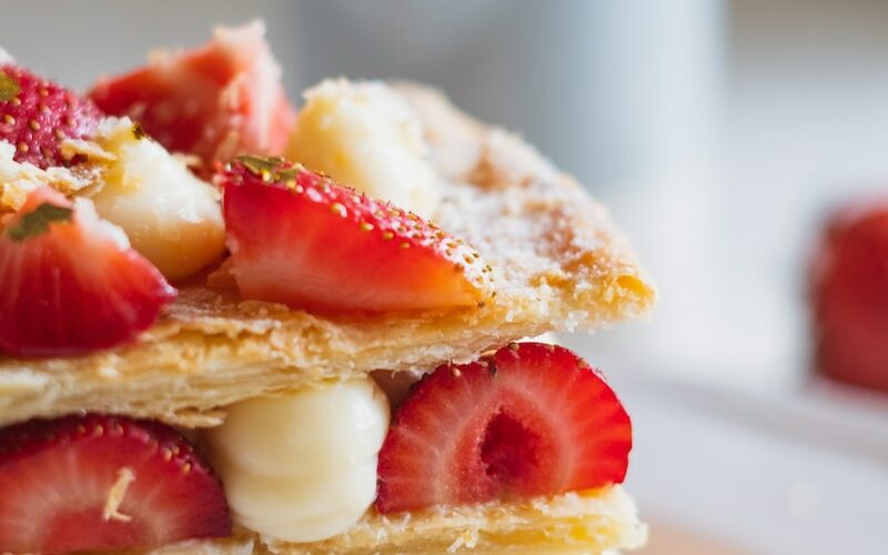 sliced strawberries on white ceramic plate