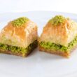 two brown bread on white ceramic plate