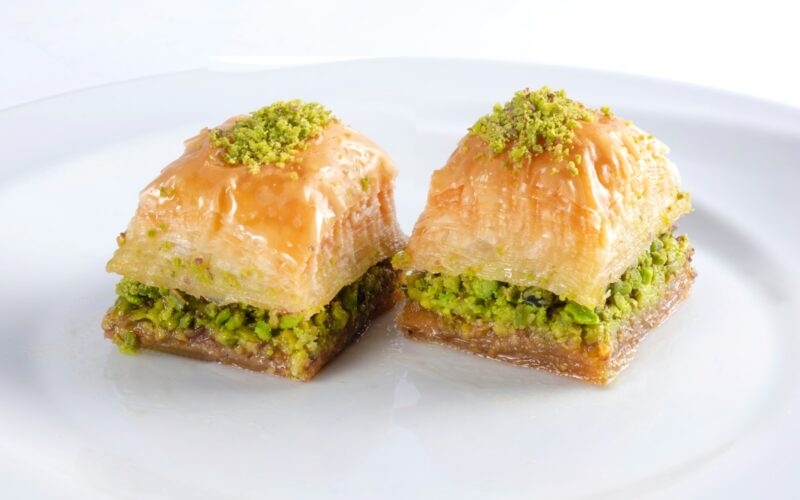 two brown bread on white ceramic plate