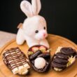 white rabbit plush toy on brown wooden table