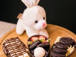 white rabbit plush toy on brown wooden table