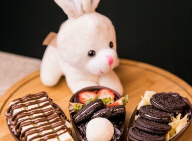 white rabbit plush toy on brown wooden table