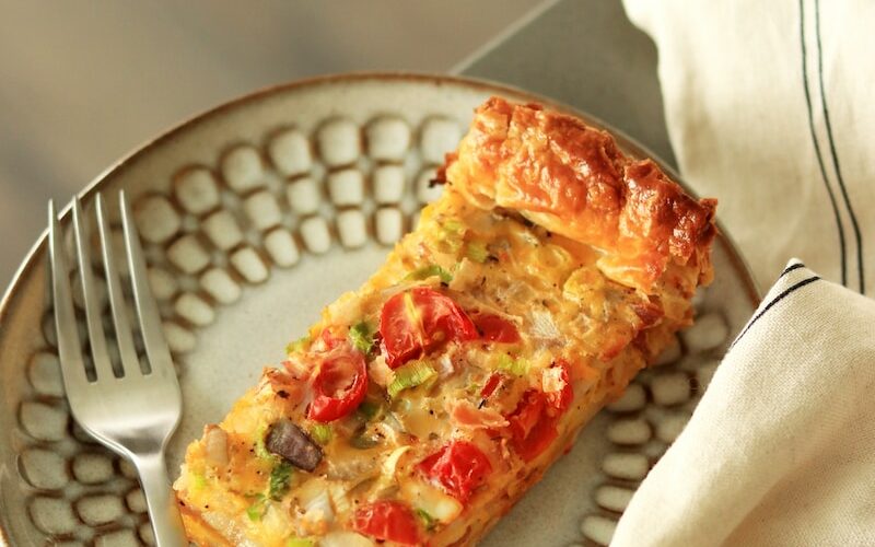 sliced pizza on white ceramic plate