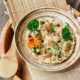 brown wooden bowl with food